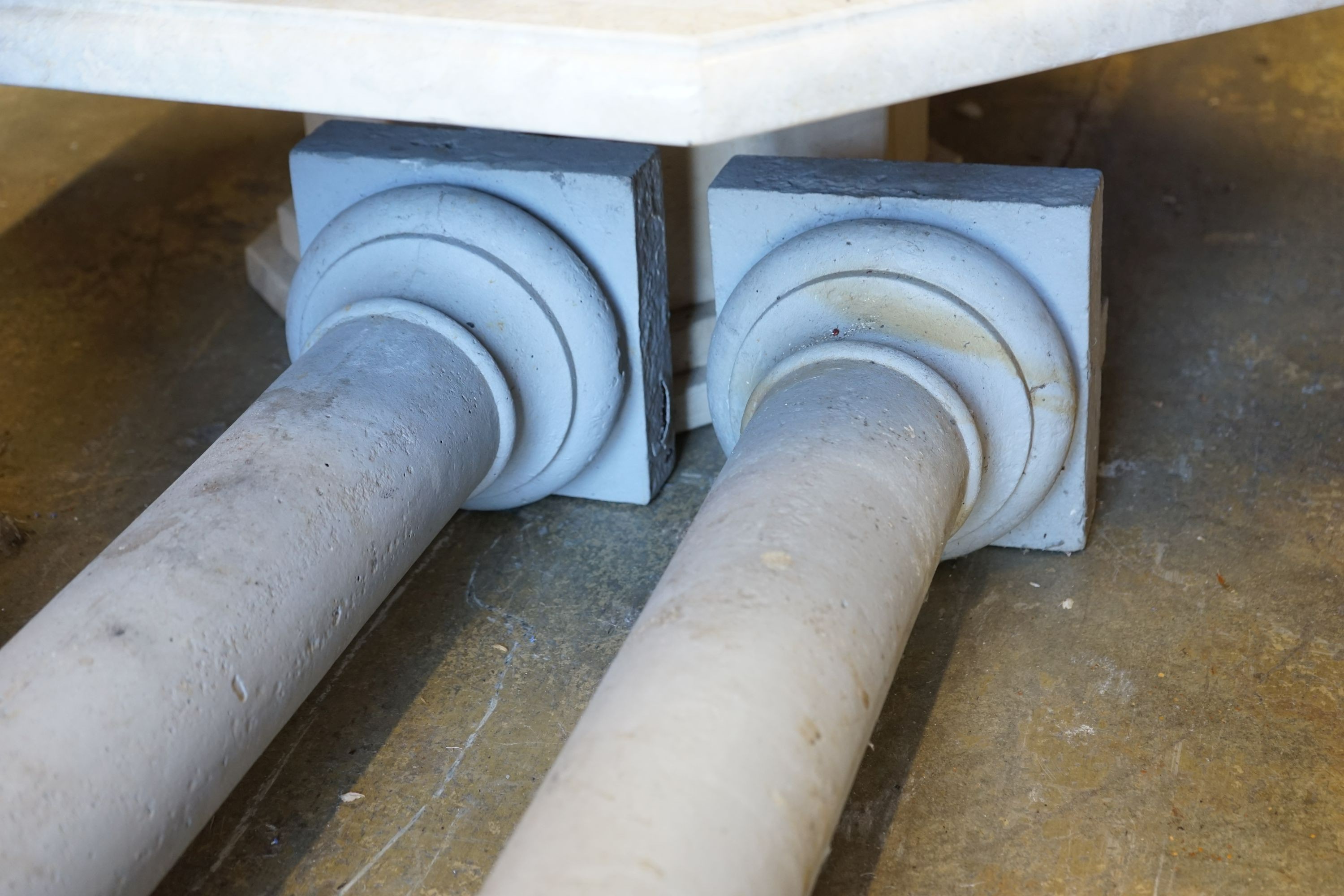 A pair of Victorian painted cast iron Corinthian columns, by repute from a West London Railway station, now demolished, height 252cm
